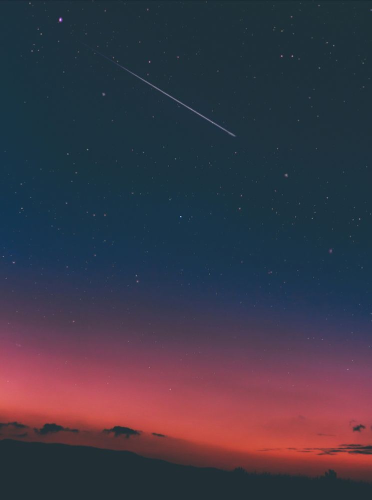 One small shooting star on starry night